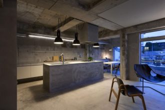 Modern and Minimal: The Short Guide For Your Apartment - Industrial Minimalist Kitchen - Image By HomeDsgn