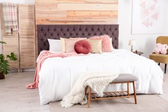 Comfy bedroom with large bed and pillows